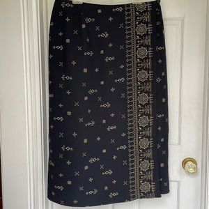 Abria woman, size 16, black wrap skirt